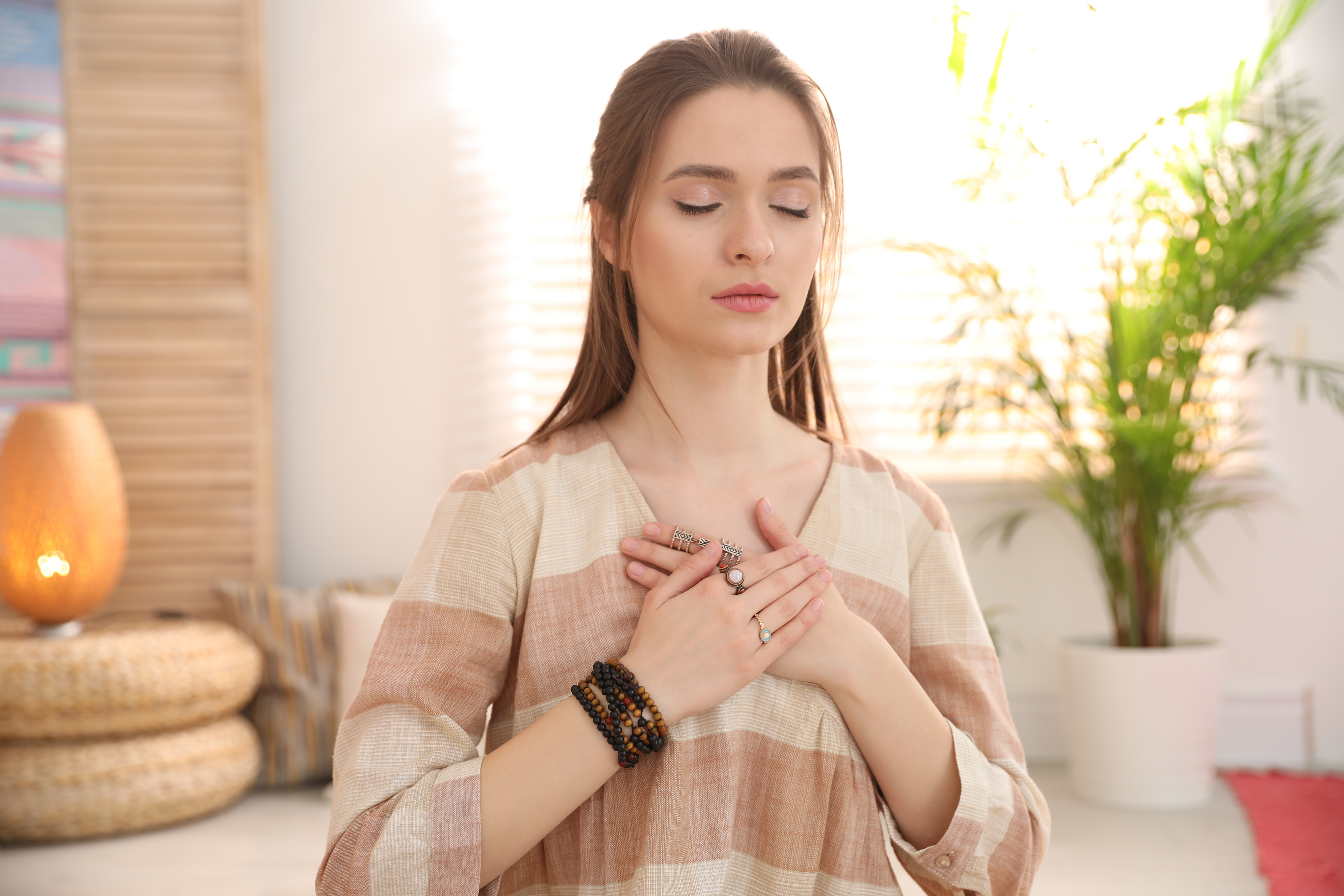 Young Woman during Self-Healing Session in  Room